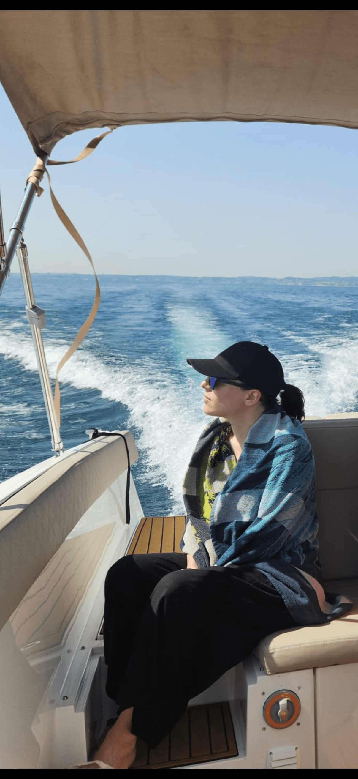 Beatrice taking a quiet moment on a boat